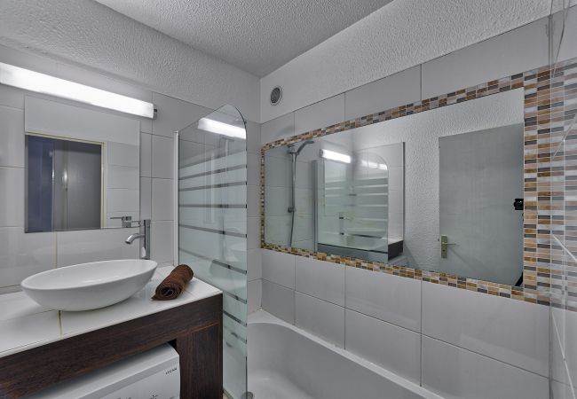 Chamonix apartment bathroom Modern bathroom with shower head