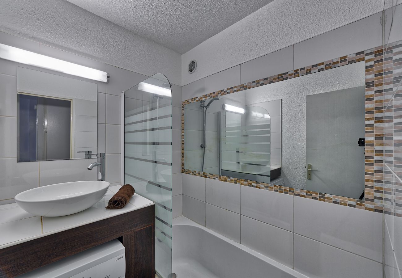 Chamonix apartment bathroom Modern bathroom with shower head
