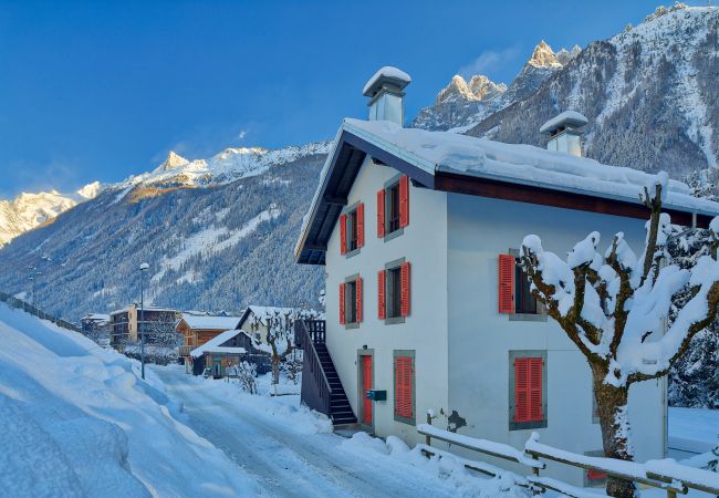 Exterior of apartment building and surrounding mountain views